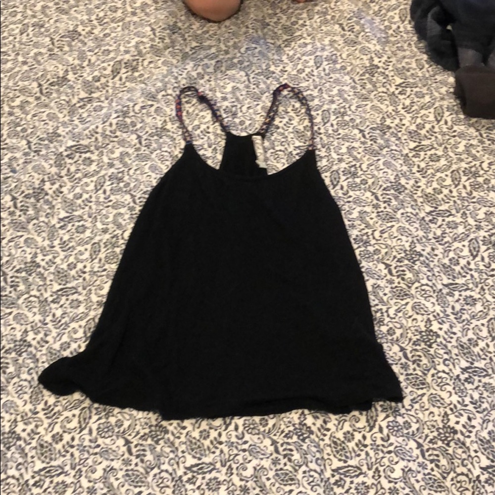small black tank with detailed straps